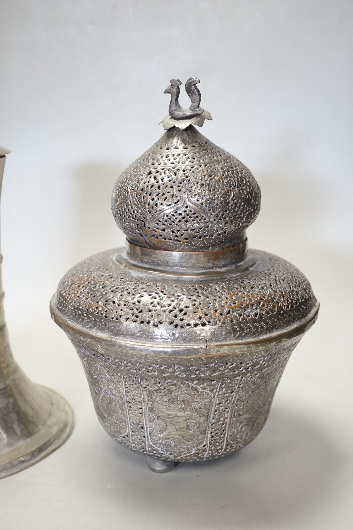 An Indian incense burner and a white metal lidded container, incense burner 29cm high